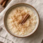 Square overhead bowl of cinnamon arroz con leche