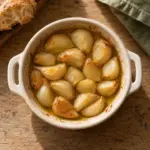 Square photograph of the finished garlic confit.