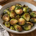 Square close view of crisp roasted Brussels sprout halves