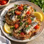 Square close-up of the finished sardine tomato toast.